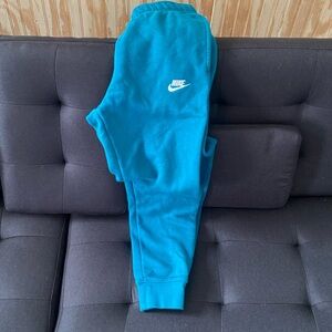 Turquoise men’s small Nike joggerss literally brand new 35$